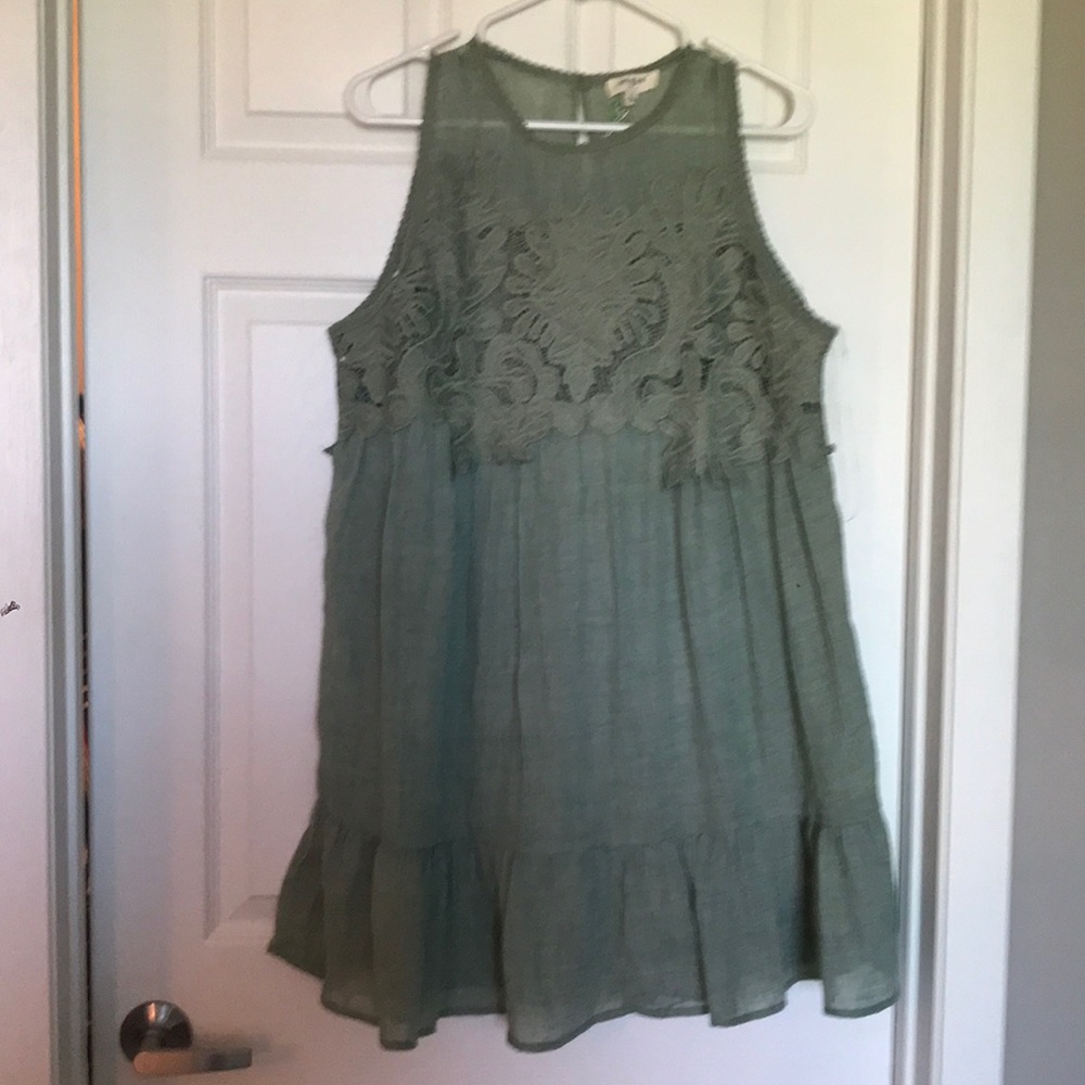 Flowy green lace dress.
